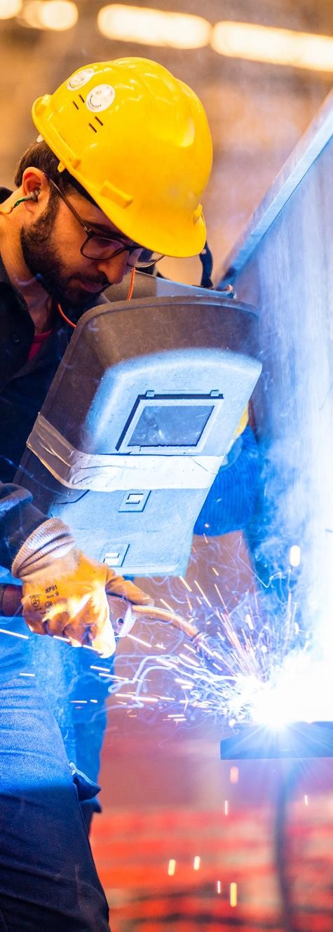 man welding with sparks flying