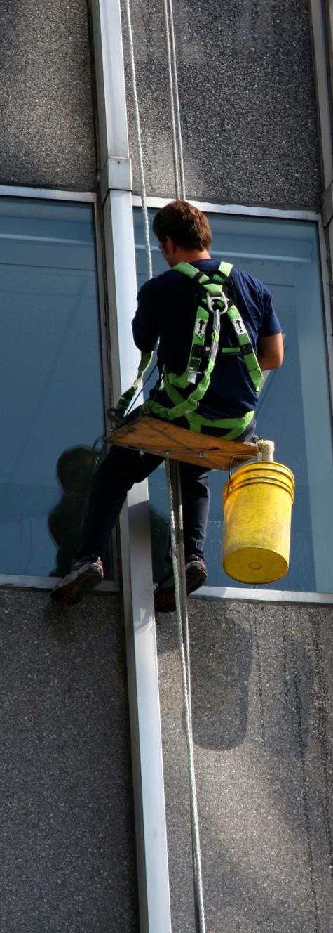 window cleaner on commercial building