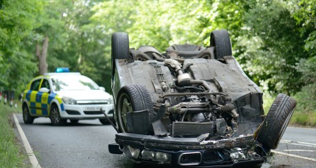 totaled car flipped over
