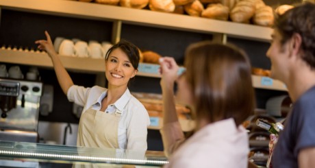 employee smiling at customers