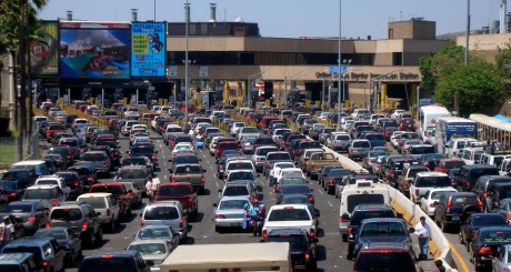 several lines of cars at the US-Mexico border