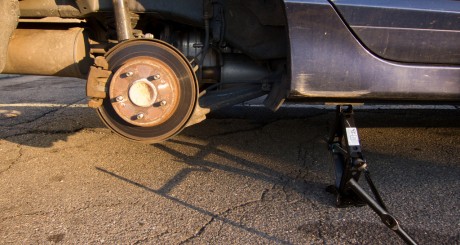 Changing tire on vehicle