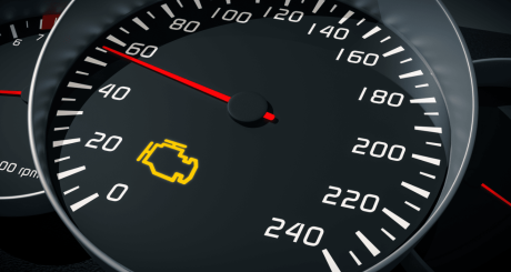 a vehicle speedometer with the check engine light on