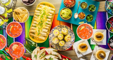 a food and decoration table spread for Cinco de Mayo