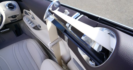 an interior of a car, focusing on the seatbelt