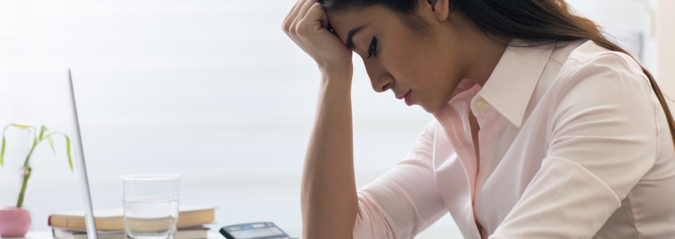 stressed woman at work stressed woman at work