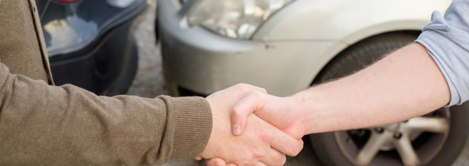 shaking hands after accident shaking hands after accident