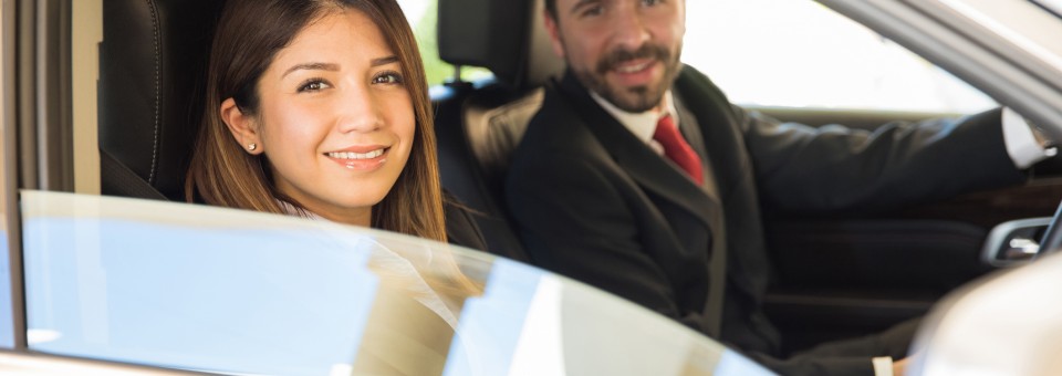 business woman and man driving business woman and man driving