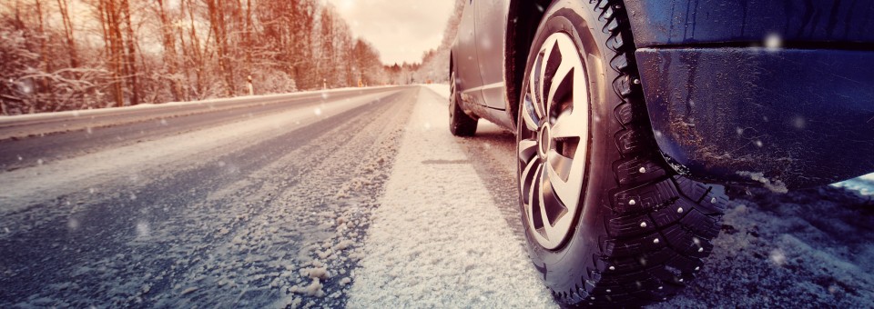 Car driving on road in winter Car driving on road in winter
