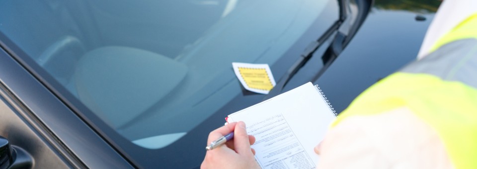 man giving traffic violation man giving traffic violation