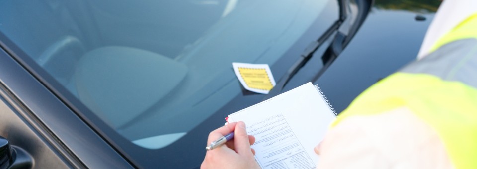 man giving traffic violation