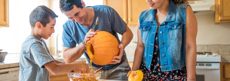 family carving pumpkin family carving pumpkin