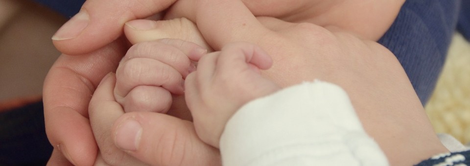 Family with Hands Together