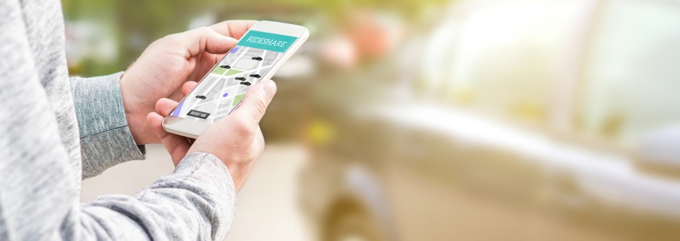 man using ridesharing app man using ridesharing app